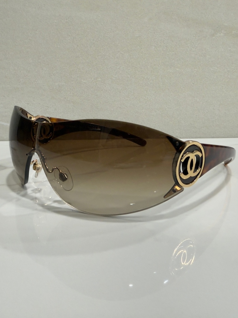 CHANEL Brown Shield Sunglasses with Gold CCs